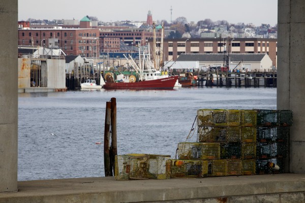 Lobster traps sit stacked on the Casco Bay Bridge abutment in South Portland on Wednesday, Nov. 21, 2012, with Portland's waterfront behind them. The greater Portland metro area now counts for more than half the state's economic output. Lobster traps sit stacked on the Casco Bay Bridge abutment in South Portland on Wednesday, Nov. 21, 2012, with Portland's waterfront behind them. The greater Portland metro area now counts for more than half the state's economic output.