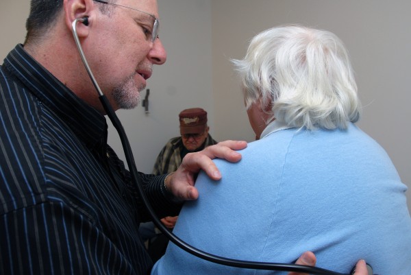 Dr. Noah Nesin examines 74-year-old Lorraine Paradis at Health Access Network in Lincoln on Friday, Nov. 23, 2012. Nesin will end about 26 years of medical practice in the Lincoln area when he takes a new job in spring 2013. Dr. Noah Nesin examines 74-year-old Lorraine Paradis at Health Access Network in Lincoln on Friday, Nov. 23, 2012. Nesin will end about 26 years of medical practice in the Lincoln area when he takes a new job in spring 2013.