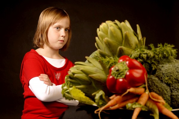 Natalie Digate Muth, a pediatrician, registered dietitian and author of "Eat Your Vegetables! and Other Mistakes Parents Make: Redefining How to Raise Healthy Eaters," says that the two best tools parents have to getting their kids to choose vegetables is by using fun and the power of their peers. Here, Sheridan Todd, 6, stares down a plate of vegetables in Walnut Creek, Calif. on Nov. 2, 2007. Natalie Digate Muth, a pediatrician, registered dietitian and author of "Eat Your Vegetables! and Other Mistakes Parents Make: Redefining How to Raise Healthy Eaters," says that the two best tools parents have to getting their kids to choose vegetables is by using fun and the power of their peers. Here, Sheridan Todd, 6, stares down a plate of vegetables in Walnut Creek, Calif. on Nov. 2, 2007.