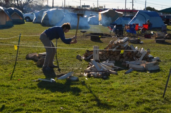 Boy Scout Kenneth Basford chops firewood during the third annual Veterans Day camp out for Troop 63 in front of Bud's Shop & Save in Newport on Saturday, Nov. 10, 2012. Boy Scout Kenneth Basford chops firewood during the third annual Veterans Day camp out for Troop 63 in front of Bud's Shop & Save in Newport on Saturday, Nov. 10, 2012.