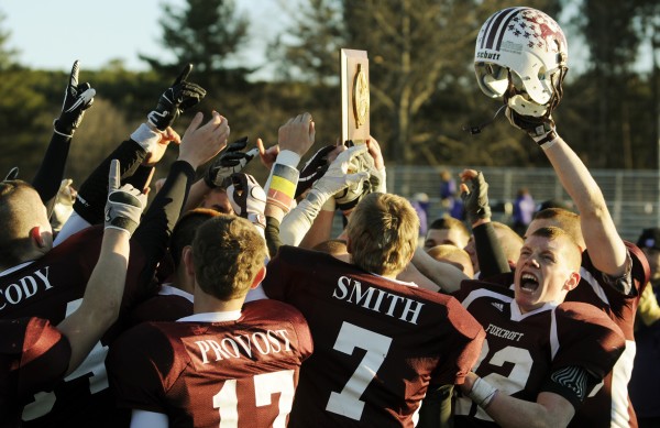 The Foxcroft Academy Ponies football team celebrates with the Class C Eastern Maine trophy on Saturday, Nov. 10, 2012, after defeating John Bapst 33-7 at Dover-Foxcroft. The Foxcroft Academy Ponies football team celebrates with the Class C Eastern Maine trophy on Saturday, Nov. 10, 2012, after defeating John Bapst 33-7 at Dover-Foxcroft.