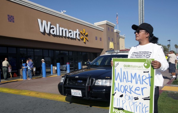 Angelita Rodriguez protests outside a Walmart store in Paramount, Calif., Friday Nov. 23, 2012. Wal-Mart employees and union supporters are taking part in today's nationwide demonstration for better pay and benefits A union-backed group called OUR Walmart, which includes former and current workers, staged the demonstrations and walkouts at hundreds of stores on Black Friday. Angelita Rodriguez protests outside a Walmart store in Paramount, Calif., Friday Nov. 23, 2012. Wal-Mart employees and union supporters are taking part in today's nationwide demonstration for better pay and benefits A union-backed group called OUR Walmart, which includes former and current workers, staged the demonstrations and walkouts at hundreds of stores on Black Friday.