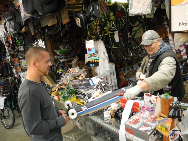 Doug Birgfeld waits on longtime customer Josh Hosea of Stockton Springs, who was buying his first longboard from Birgfeld's Bicycle Shop on Route 1 in Searsport. "I love coming here," Hosea said. Doug Birgfeld waits on longtime customer Josh Hosea of Stockton Springs, who was buying his first longboard from Birgfeld's Bicycle Shop on Route 1 in Searsport. "I love coming here," Hosea said.