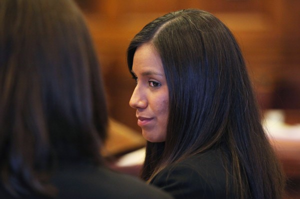 Alexis Wright, 29, turns towards her attorney Sarah Churchill, left, during her Oct. 9 arraignment in Portland on 109 counts of prostitution, violation of privacy, tax evasion and other charges for allegedly providing sex for money at her Kennebunk fitness studio and office. Alexis Wright, 29, turns towards her attorney Sarah Churchill, left, during her Oct. 9 arraignment in Portland on 109 counts of prostitution, violation of privacy, tax evasion and other charges for allegedly providing sex for money at her Kennebunk fitness studio and office.