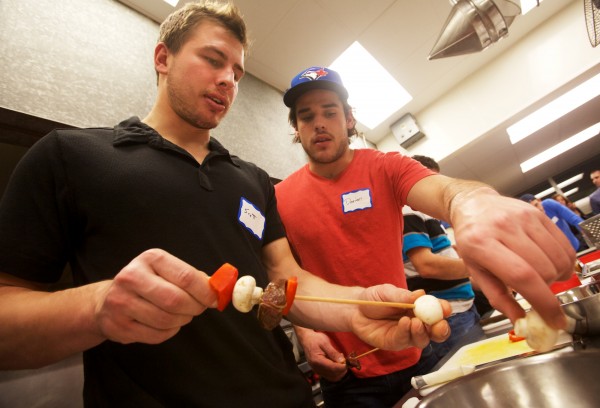 Portland Pirates hockey team members Scott Arnold (left) and Darian Dziurzynski put food on skewers while having a cooking lesson at Southern Maine Community College in South Portland on Tuesday, Nov. 27, 2012. About a dozen teammates took part in the four-hour course, learning to prepare a variety of healthy meals. Portland Pirates hockey team members Scott Arnold (left) and Darian Dziurzynski put food on skewers while having a cooking lesson at Southern Maine Community College in South Portland on Tuesday, Nov. 27, 2012. About a dozen teammates took part in the four-hour course, learning to prepare a variety of healthy meals.