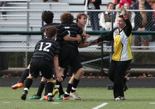 The Houlton Shiretowners celebrate after their second goal during the Maine Principals' Association Class C Boys Soccer State Championship Saturday, Nov. 3, at Scarborough High School in Scarborough, Maine. The Houlton Shiretowners celebrate after their second goal during the Maine Principals' Association Class C Boys Soccer State Championship Saturday, Nov. 3, at Scarborough High School in Scarborough, Maine.