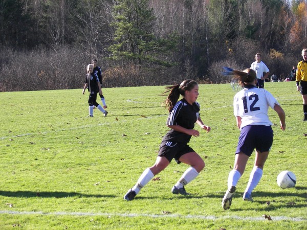 Brie Saulter (left) of the Bronco Travel Soccer Club in Hampden races after a loose ball during the SoccerMaine Fall League's Under-14 girls state championship game Sunday, Nov. 4, 2012, in Yarmouth. Bronco Travel defeated Portland Area Youth Soccer Association 3-0. Brie Saulter (left) of the Bronco Travel Soccer Club in Hampden races after a loose ball during the SoccerMaine Fall League's Under-14 girls state championship game Sunday, Nov. 4, 2012, in Yarmouth. Bronco Travel defeated Portland Area Youth Soccer Association 3-0.