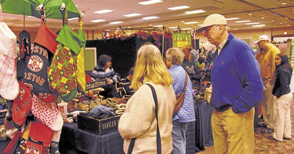Seeking unique Christmas gifts, shoppers wander the aisles during the 24th Bangor Arts & Crafts Show, held Nov. 3-4 at the Bangor Civic Center and sponsored by United Maine Craftsmen. Seeking unique Christmas gifts, shoppers wander the aisles during the 24th Bangor Arts & Crafts Show, held Nov. 3-4 at the Bangor Civic Center and sponsored by United Maine Craftsmen.