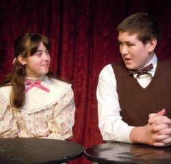 Jessie Walker as Emily Webb and Will Martin as George Gibbs in the Orono Community Theatre production of Thornton Wilder's OUR TOWN. Jessie Walker as Emily Webb and Will Martin as George Gibbs in the Orono Community Theatre production of Thornton Wilder's OUR TOWN.
