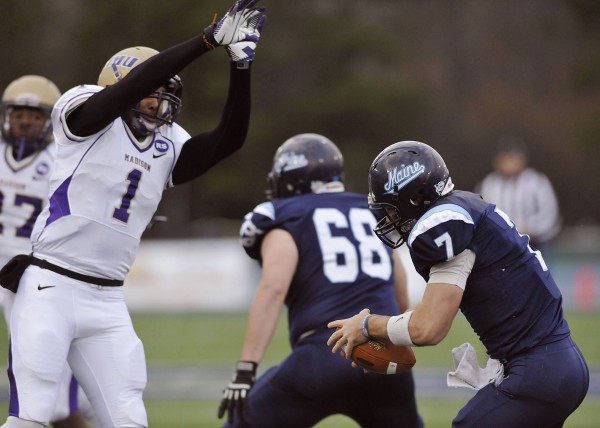 Maine quarterback Marcus Wasilewski (7) is unable to avoid James Madison safety Titus Till (1) who got the sack in the first half of an NCAA college football game in Orono, Maine, Saturday, Nov. 3, 2012. Maine quarterback Marcus Wasilewski (7) is unable to avoid James Madison safety Titus Till (1) who got the sack in the first half of an NCAA college football game in Orono, Maine, Saturday, Nov. 3, 2012.