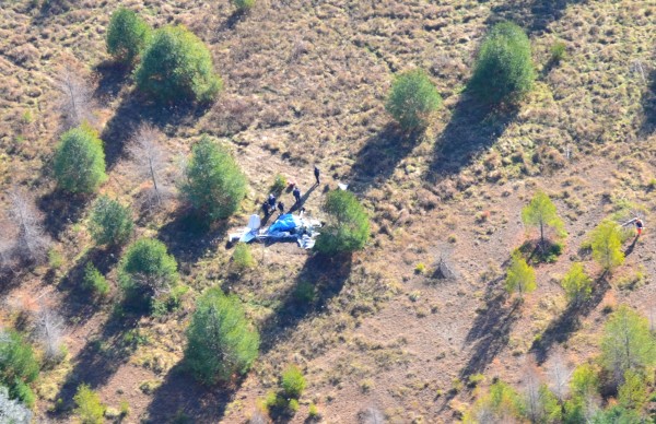 Officials cluster Saturday morning around a small plane that crashed Friday evening after taking off form the Knox County Regional Airport, killing three. Officials cluster Saturday morning around a small plane that crashed Friday evening after taking off form the Knox County Regional Airport, killing three.