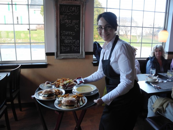 Waitress Michelle Pooler gets ready to serve plates of burgers and bowls of soup Monday at the new Route One RoadHouse in Searsport. Waitress Michelle Pooler gets ready to serve plates of burgers and bowls of soup Monday at the new Route One RoadHouse in Searsport.