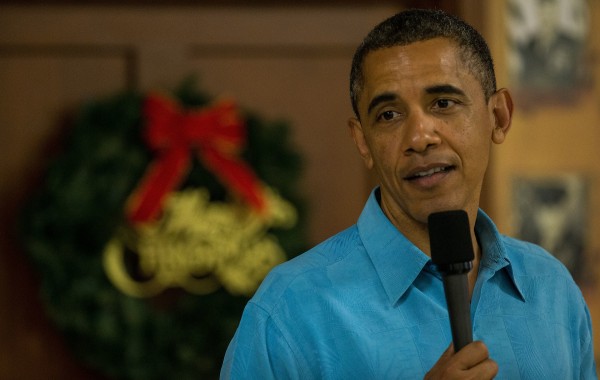 President Barack Obama delivers remarks while visiting military personnel eating Christmas dinner at Anderson Hall at Marine Corps Base Hawaii. President Barack Obama delivers remarks while visiting military personnel eating Christmas dinner at Anderson Hall at Marine Corps Base Hawaii.