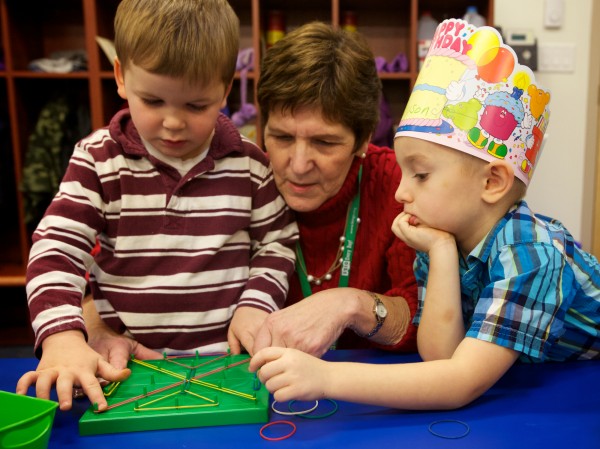 Rosalie Perkins, a pre-K teacher at the Woolwich Central School, talks about shapes and lines with students Garrett Craney (left) and Payson Bowling on Thursday, Dec. 20, 2012. Rosalie Perkins, a pre-K teacher at the Woolwich Central School, talks about shapes and lines with students Garrett Craney (left) and Payson Bowling on Thursday, Dec. 20, 2012.