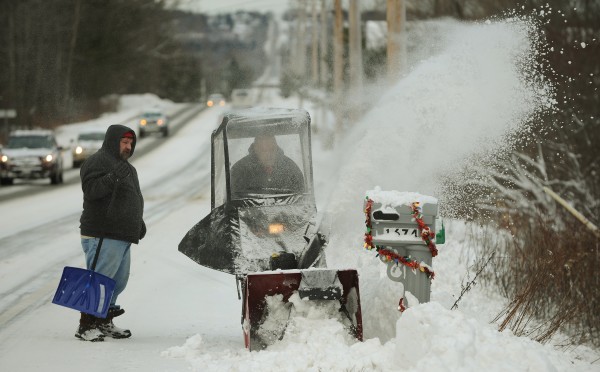 Rick Bragg (left) and Jerry Watson clear snow from their mailbox along Union Street in Bangor on Friday, Dec. 28, 2012. People across the region were clearing driveways and raking roofs after Thursday's snowstorm dumped 7 inches of snow on the Bangor area according to the National Weather Service. Houlton residents got 16.5 inches of snow according to the National Weather Service. Rick Bragg (left) and Jerry Watson clear snow from their mailbox along Union Street in Bangor on Friday, Dec. 28, 2012. People across the region were clearing driveways and raking roofs after Thursday's snowstorm dumped 7 inches of snow on the Bangor area according to the National Weather Service. Houlton residents got 16.5 inches of snow according to the National Weather Service.