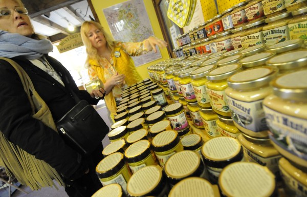 Karen Raye of Raye's Mustard in Eastport helps Linda McKee (left) of Florida with choosing from one of many mustard varieties at the store. McKee was among the residents aboard The World who debarked the 644-foot vessel to enjoy sightseeing and shopping in Eastport Tuesday, Oct. 9, 2012. Karen Raye of Raye's Mustard in Eastport helps Linda McKee (left) of Florida with choosing from one of many mustard varieties at the store. McKee was among the residents aboard The World who debarked the 644-foot vessel to enjoy sightseeing and shopping in Eastport Tuesday, Oct. 9, 2012.