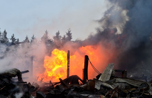 Crews from three departments responded just after 9:30 a.m. to the fire at Benn Auto Sales, Inc., on Calais Road and found the three-story barn housing the business fully involved, according to Rick Tidd, assistant chief of the Hodgdon Volunteer Fire Department. Crews from three departments responded just after 9:30 a.m. to the fire at Benn Auto Sales, Inc., on Calais Road and found the three-story barn housing the business fully involved, according to Rick Tidd, assistant chief of the Hodgdon Volunteer Fire Department.