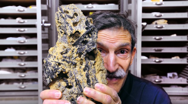 Edward Grew, a geologist and research professor at the University of Maine, holds a rock sample from Antarctica that contains the mineral prismatine. Grew has discovered several minerals himself and he was instrumental in the revalidation of prismatine. Russian geologists Evgeny Galuskin and Irina Galuskina named two recently discovered minerals Edgrewite and hydroxyledgrewite in honor of Grew who has been working in this field for over 40 years. Edward Grew, a geologist and research professor at the University of Maine, holds a rock sample from Antarctica that contains the mineral prismatine. Grew has discovered several minerals himself and he was instrumental in the revalidation of prismatine. Russian geologists Evgeny Galuskin and Irina Galuskina named two recently discovered minerals Edgrewite and hydroxyledgrewite in honor of Grew who has been working in this field for over 40 years.