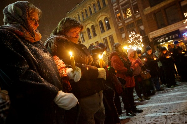 Concerned citizens hold candles at a vigil in Portland's Monument Square on Sunday night Dec. 16, 2012. The vigil was organized by Maine Citizens Against Handgun Violence in response to the Connecticut school shooting Friday. Concerned citizens hold candles at a vigil in Portland's Monument Square on Sunday night Dec. 16, 2012. The vigil was organized by Maine Citizens Against Handgun Violence in response to the Connecticut school shooting Friday.