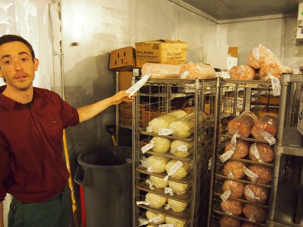 Blair Currier, Portland School Department local food specialist, stands in the gym-turned-freezer at the Reed Commissary, the department's central kitchen. The central kitchen makes and delivers food to 10 schools, serving more than 1 million meals a year. The kitchen failed its most recent health inspection a year ago. Blair Currier, Portland School Department local food specialist, stands in the gym-turned-freezer at the Reed Commissary, the department's central kitchen. The central kitchen makes and delivers food to 10 schools, serving more than 1 million meals a year. The kitchen failed its most recent health inspection a year ago.