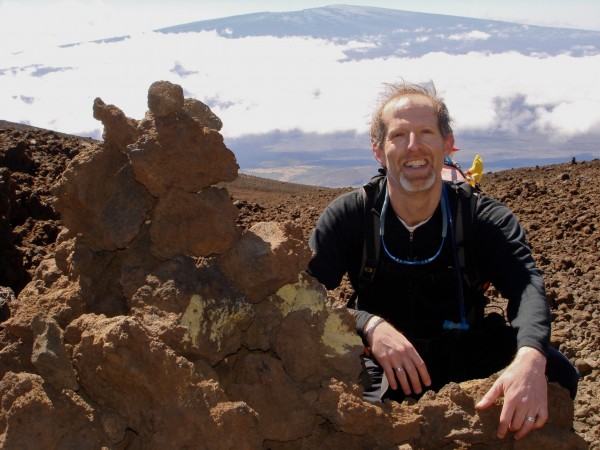 David B. Williams, author of "Cairns: Messengers in Stone," published October 2012, sits beside a cairn on Mauna Loa on Hawaii. In Hawaii, these rock piles are known as "ahu." David B. Williams, author of "Cairns: Messengers in Stone," published October 2012, sits beside a cairn on Mauna Loa on Hawaii. In Hawaii, these rock piles are known as "ahu."
