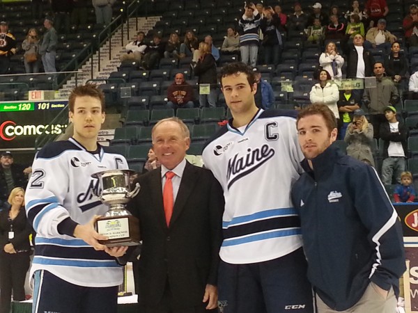 University of Maine hockey captains (from left) Mike Cornell, Mark Nemec and Joey Diamond pose with Florida Everblades President Craig Brush and the championship trophy Saturday night after beating Cornell 5-2 to win the Florida College Classic in Estero, Fla. University of Maine hockey captains (from left) Mike Cornell, Mark Nemec and Joey Diamond pose with Florida Everblades President Craig Brush and the championship trophy Saturday night after beating Cornell 5-2 to win the Florida College Classic in Estero, Fla.