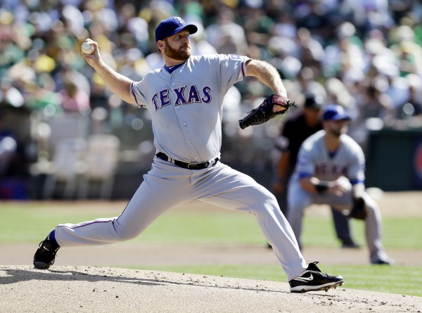 Texas Rangers starting pitcher Ryan Dempster throws against the Oakland Athletics on Oct. 3. The Boston Red Sox have agreed to terms with Dempster on a two-year contract worth $26.5 million, according to two people familiar with the negotiations. Texas Rangers starting pitcher Ryan Dempster throws against the Oakland Athletics on Oct. 3. The Boston Red Sox have agreed to terms with Dempster on a two-year contract worth $26.5 million, according to two people familiar with the negotiations.