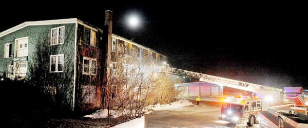 The moon rises above the former Morin Fine Furniture and Refinishing shop at 177 Turner St. as the Auburn Fire Department responds to a fire inside the building on Wednesday. The moon rises above the former Morin Fine Furniture and Refinishing shop at 177 Turner St. as the Auburn Fire Department responds to a fire inside the building on Wednesday.