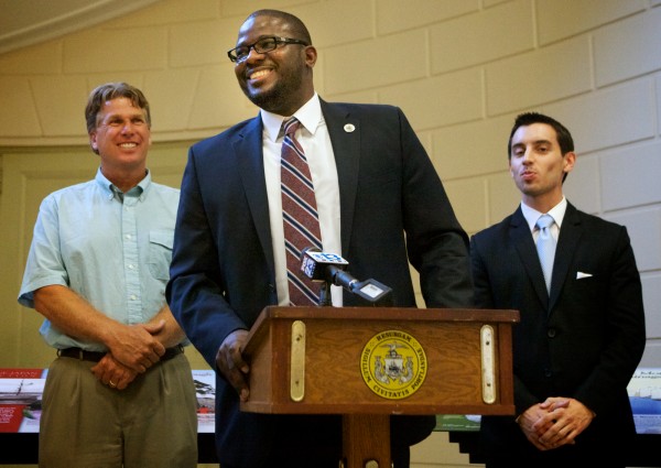 New Portland School Superintendent Emmanuel Caulk, flanked by Lyman Moore Middle School Principal Stephen Rogers (left) and school board member Justin Costa, speaks at a press conference after being confirmed by the board Monday night July 9, 2012. New Portland School Superintendent Emmanuel Caulk, flanked by Lyman Moore Middle School Principal Stephen Rogers (left) and school board member Justin Costa, speaks at a press conference after being confirmed by the board Monday night July 9, 2012.