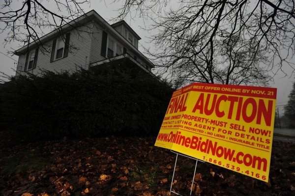 An auction sign in front of a home on Bangor's west side in November 2010. An auction sign in front of a home on Bangor's west side in November 2010.