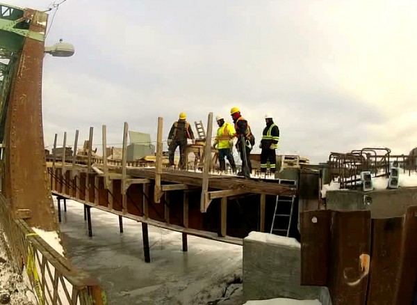 Workers with Fredericton, New Brunswick-based Caldwell and Ross LLC work in frigid temperatures Friday morning, Jan. 25, 2013 on the new international bridge connecting Fort Kent and Clair, New Brunswick. Workers with Fredericton, New Brunswick-based Caldwell and Ross LLC work in frigid temperatures Friday morning, Jan. 25, 2013 on the new international bridge connecting Fort Kent and Clair, New Brunswick.