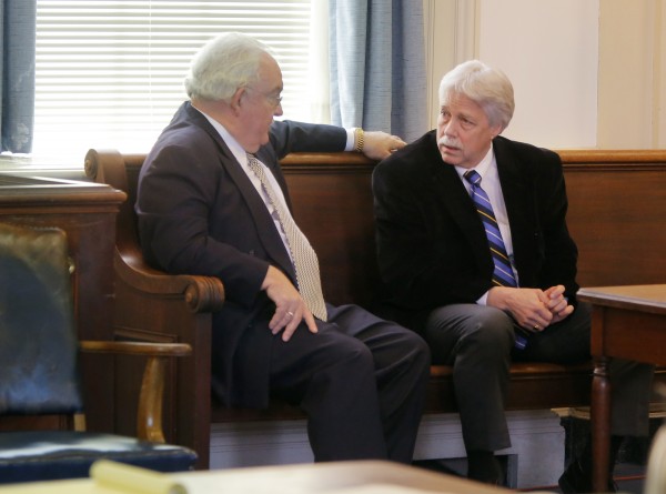 Mark Strong (right) talks with his attorney Dan Lilley after Justice Nancy Mills dropped 46 charges against Strong at York County Superior Court in Alfred on Thursday, Jan. 24. Strong still faces 13 counts. Mark Strong (right) talks with his attorney Dan Lilley after Justice Nancy Mills dropped 46 charges against Strong at York County Superior Court in Alfred on Thursday, Jan. 24. Strong still faces 13 counts.