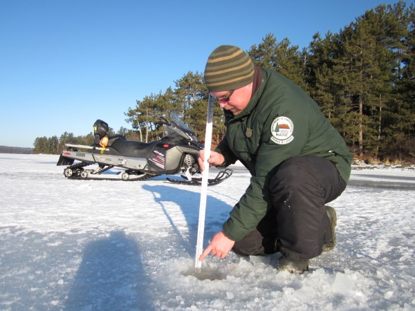 Ranger Chris Silsbee checks the ice on Telos Lake recently. Ranger Chris Silsbee checks the ice on Telos Lake recently.