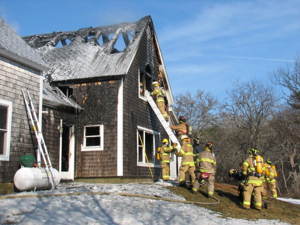Firefighters try to extinguish a morning blaze at a home off Route 3 in Trenton on Tuesday, Jan. 29, 2013. Firefighters try to extinguish a morning blaze at a home off Route 3 in Trenton on Tuesday, Jan. 29, 2013.