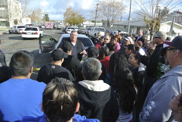 Taft Police Chief Ed Whiting speaks to concerned parents after a shooting at Taft Union High School in Taft, Calif., on Jan. 10, 2013. Gunfire erupted on Thursday at the school. Two people were injured, county officials said, and media reports indicated the assailant had been arrested. Taft Police Chief Ed Whiting speaks to concerned parents after a shooting at Taft Union High School in Taft, Calif., on Jan. 10, 2013. Gunfire erupted on Thursday at the school. Two people were injured, county officials said, and media reports indicated the assailant had been arrested.