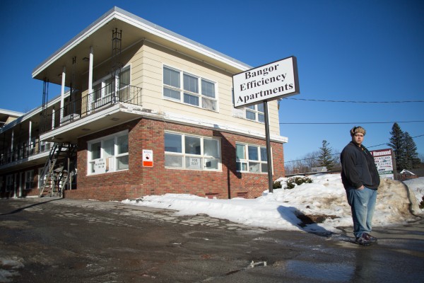 Mike Soto waits for the bus to take him to work in front of the Bangor Efficiency Apartments on Thursday. Soto said he is not a resident of the apartment complex but has several friends who live there and acknowledges that the complex has had problems. Mike Soto waits for the bus to take him to work in front of the Bangor Efficiency Apartments on Thursday. Soto said he is not a resident of the apartment complex but has several friends who live there and acknowledges that the complex has had problems.