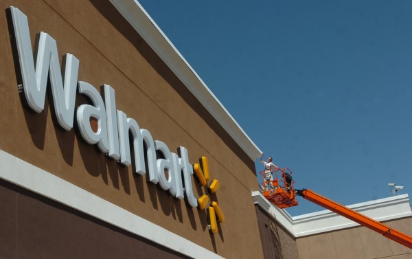 A laborer works on completing the finishing touches to the new Bangor Walmart on Thursday, July 9, 2009. A laborer works on completing the finishing touches to the new Bangor Walmart on Thursday, July 9, 2009.