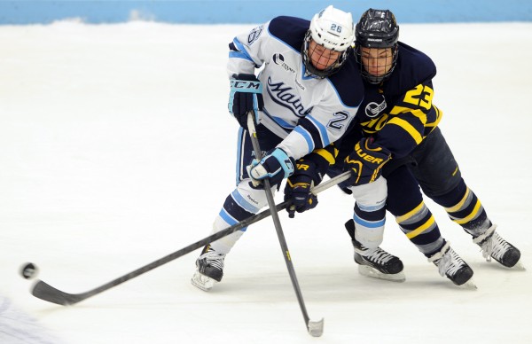Merrimack's Josh Myers (left) gets the puck away from Maine's Adam Shemansky in the first period of Friday nights game at Alfornd Arena on Friday, Jan. 18, 2013. Merrimack's Josh Myers (left) gets the puck away from Maine's Adam Shemansky in the first period of Friday nights game at Alfornd Arena on Friday, Jan. 18, 2013.