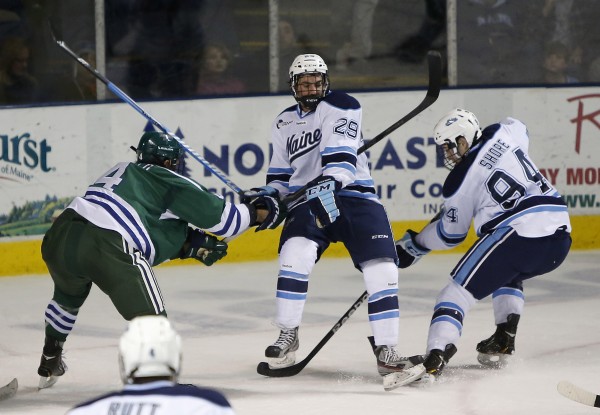 Maine's Connor Leen gets caught in the middle as his teammate Devin Shore (right) fights for the puck with Mercyhurst's Tyler Shipo in the second period at the Cumberland County Civic Center, Friday, Jan 4, 2013, in Portland, Maine. Maine's Connor Leen gets caught in the middle as his teammate Devin Shore (right) fights for the puck with Mercyhurst's Tyler Shipo in the second period at the Cumberland County Civic Center, Friday, Jan 4, 2013, in Portland, Maine.