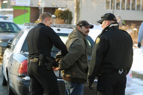 Bangor Police officers Brian Smith (left) and Joe Baillargeon right take John Leonard, 47, of Bangor into custody on Monday, Jan. 7, 2013. Leonard was arrested and charged with criminal threatening with a dangerous weapon. Bangor Police officers Brian Smith (left) and Joe Baillargeon right take John Leonard, 47, of Bangor into custody on Monday, Jan. 7, 2013. Leonard was arrested and charged with criminal threatening with a dangerous weapon.
