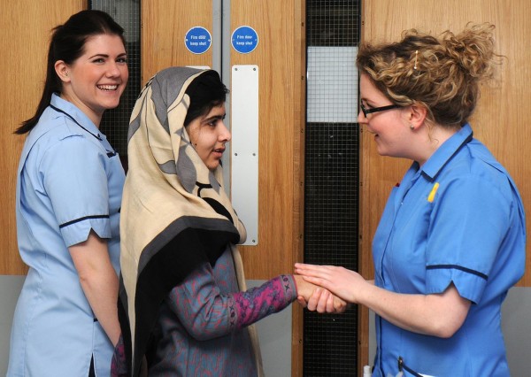 Pakistani schoolgirl and education activist Malala Yousufzai (center) smiles with nurses as she is discharged from The Queen Elizabeth Hospital in Birmingham, England, in this handout photograph released on Jan, 4, 2013. The Pakistani girl shot in the head by the Taliban for advocating girls' education has been discharged from a specialist British hospital after doctors said she was well enough to spend some time recovering with her family. Pakistani schoolgirl and education activist Malala Yousufzai (center) smiles with nurses as she is discharged from The Queen Elizabeth Hospital in Birmingham, England, in this handout photograph released on Jan, 4, 2013. The Pakistani girl shot in the head by the Taliban for advocating girls' education has been discharged from a specialist British hospital after doctors said she was well enough to spend some time recovering with her family.