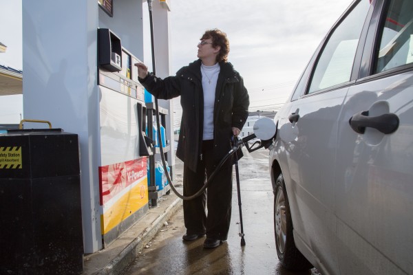 Mary McLaughlin pumps gas at the Shell station on the corner of Union Street and Griffin street on Tuesday, Jan. 8, 2013. "I know that more ethanol is not supposed to be good for your car. So I would be concerned it would ruin my car more," said McLaughlin. Mary McLaughlin pumps gas at the Shell station on the corner of Union Street and Griffin street on Tuesday, Jan. 8, 2013. "I know that more ethanol is not supposed to be good for your car. So I would be concerned it would ruin my car more," said McLaughlin.