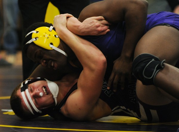 Bucksport's KP Hilaire, top, and Foxcroft's Cory Bjornson compete during the finals of Saturday's Penobscot Valley Conference Championship meet at Bucksport High School. Hilaire beat Bjornson in the 195-pound class. Bucksport's KP Hilaire, top, and Foxcroft's Cory Bjornson compete during the finals of Saturday's Penobscot Valley Conference Championship meet at Bucksport High School. Hilaire beat Bjornson in the 195-pound class.