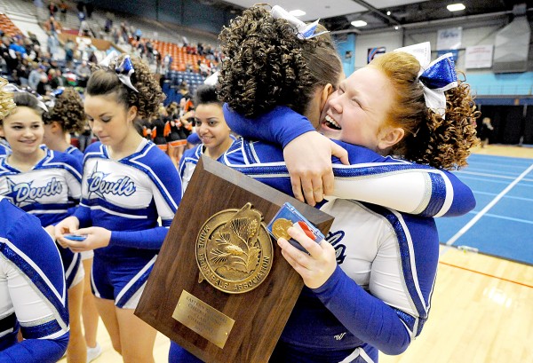Taylor Pratt, right, celebrates with Erika Thibault after Lewiston High School won the Class A East Regional Cheering Competition at the Augusta Civic Center on Saturday. Taylor Pratt, right, celebrates with Erika Thibault after Lewiston High School won the Class A East Regional Cheering Competition at the Augusta Civic Center on Saturday.