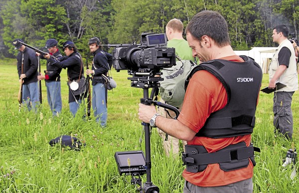 Todd Eastman, a faculty member at the New England School of Communications in Bangor, films footage with a Steadicam last August during a Civil War re-enactment held at the Good Will-Hinckley School in Fairfield. He shot the footage for a Maine Public Broadcasting Network documentary titled “Sixteenth Maine at Gettysburg.” Todd Eastman, a faculty member at the New England School of Communications in Bangor, films footage with a Steadicam last August during a Civil War re-enactment held at the Good Will-Hinckley School in Fairfield. He shot the footage for a Maine Public Broadcasting Network documentary titled “Sixteenth Maine at Gettysburg.”