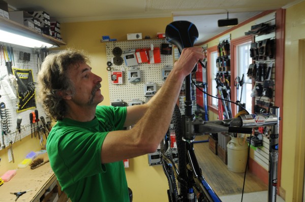 Jim Rose, owner of Rose Bike shop in Orono, fits a bike with a seat on Tuesday. Rose says he's disappointed in Lance Armstrong but thinks Armstrong has done a lot of good for people and should be credited for that. Jim Rose, owner of Rose Bike shop in Orono, fits a bike with a seat on Tuesday. Rose says he's disappointed in Lance Armstrong but thinks Armstrong has done a lot of good for people and should be credited for that.