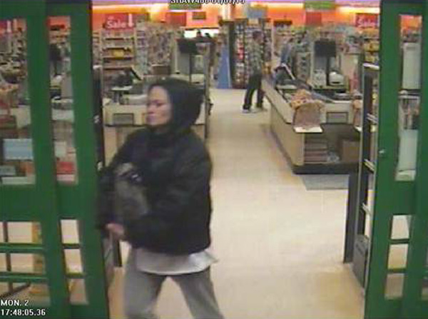 Surveillance images released by the Bangor Police Department Tuesday show a woman leaving Shaw’s Supermarket on Main Street with a large pocketbook in her hands. Surveillance images released by the Bangor Police Department Tuesday show a woman leaving Shaw’s Supermarket on Main Street with a large pocketbook in her hands.