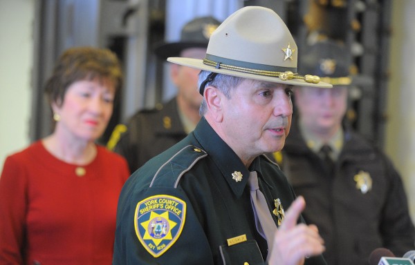 Maj. William King Jr. of the York County Sheriff's Office speaks during a press conference about a highly sophisticated telephone scam that targets senior citizens. King spearheaded an initial investigation and now participates in the effort to bring the message to people about the ongoing scam. Pictured on the left is U.S. Sen. Susan Collins, who also spoke during the event at the Hammond Street Senior Center in Bangor. Maj. William King Jr. of the York County Sheriff's Office speaks during a press conference about a highly sophisticated telephone scam that targets senior citizens. King spearheaded an initial investigation and now participates in the effort to bring the message to people about the ongoing scam. Pictured on the left is U.S. Sen. Susan Collins, who also spoke during the event at the Hammond Street Senior Center in Bangor.