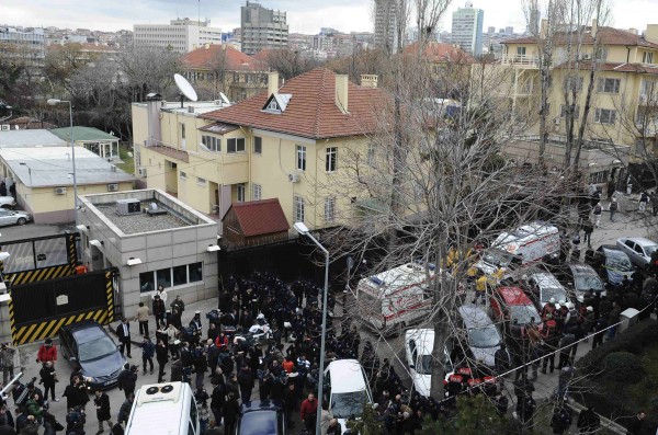 Riot police block a street after an explosion at the entrance of the U.S. embassy in Ankara. Riot police block a street after an explosion at the entrance of the U.S. embassy in Ankara.