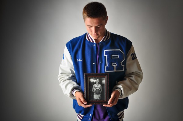 Jonesport-Beals basketball standout Garet Beal holds a photo of his dad, Lindell Beal, who died in July at age 43. Jonesport-Beals basketball standout Garet Beal holds a photo of his dad, Lindell Beal, who died in July at age 43.